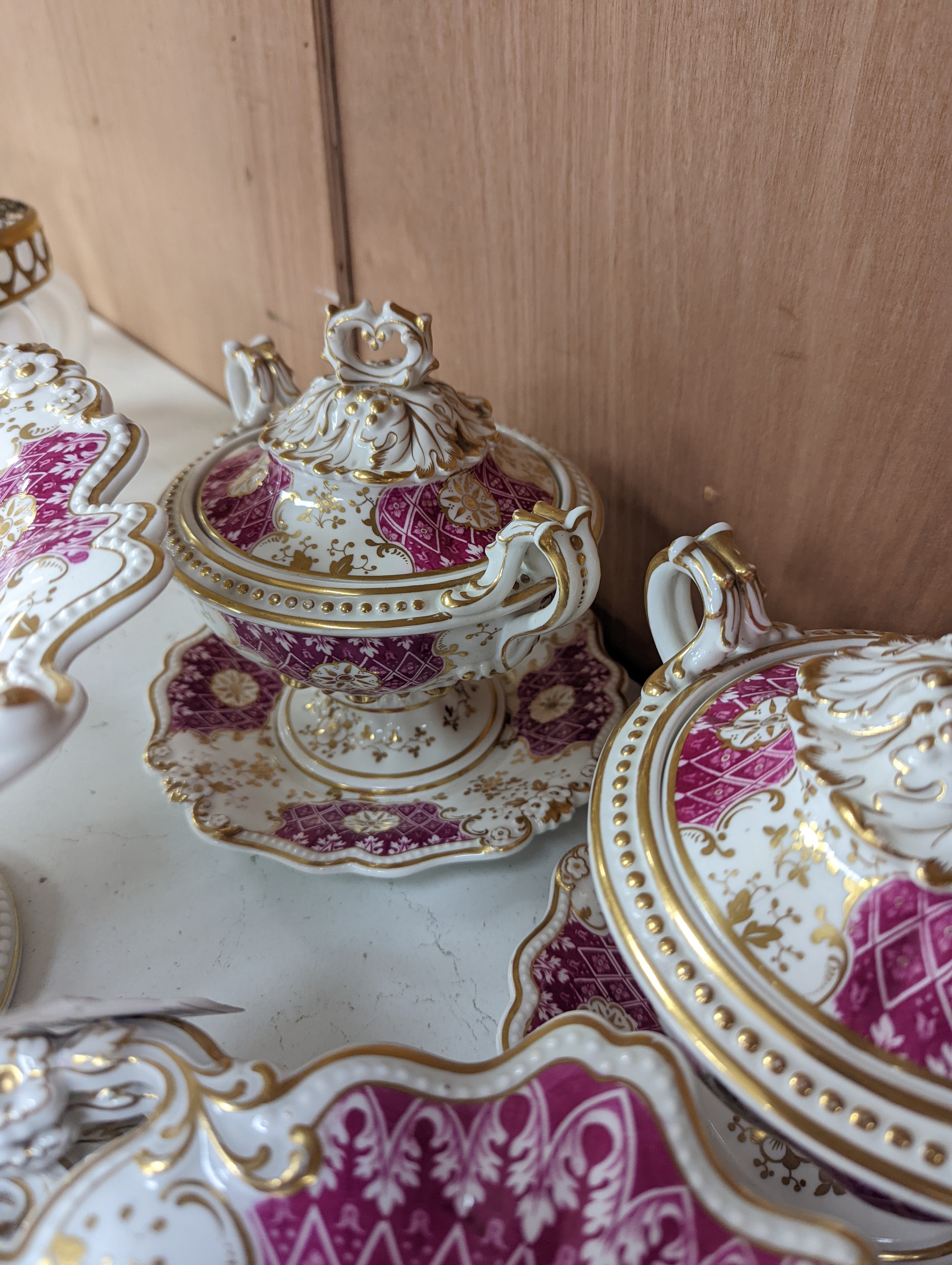 A Ridgways porcelain topographical part dessert service, c.1835, pattern number 2168, the sauce tureens and covers pattern number 2179